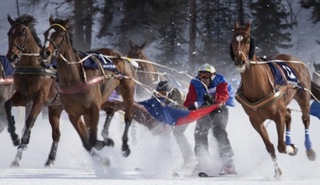 St. Moritz skijoring fans shrug off the cold with champagne and caviar