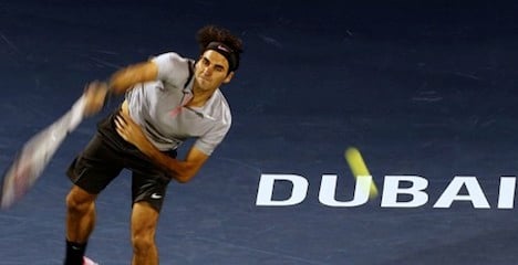Federer survives close scare at Dubai Open