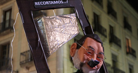 Spanish PM Rajoy touts low deficit figure