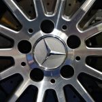 Daimler revs up profits on record sales