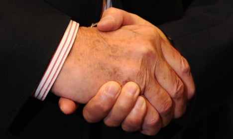 3. If in doubt, shake hands<br>As well as shaking hands in greeting, Germans also shake hands with everyone in a room before <i>and after</i> a business meeting or conference. If you have to leave early, shake everyone's hand again, starting with the most senior person present and working down. The German handshake is firm and brief, said to convey confidence and reliability. A weak handshake will suggest you are unsure of your abilities.Photo: DPA