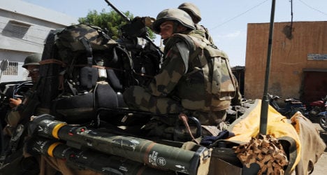 French troops hand over Mali rebel weapons