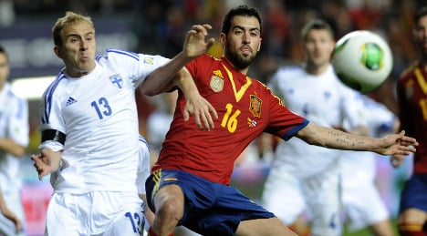 Champions Spain held at home by feisty Finland