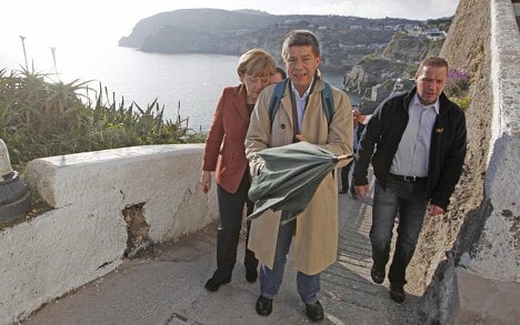 Merkel angry at paparazzi swimsuit shots in Italy