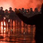 Swiss police clash with protesters at techno rally