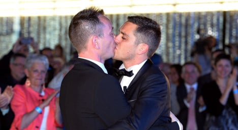 France makes history as first gay couple wed