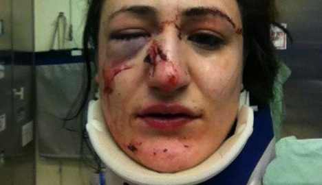 Cop faces charges for punching woman