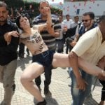 French feminists held after baring all in Tunisia