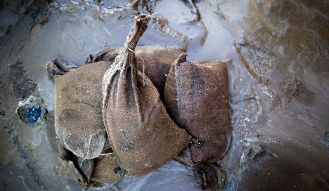 Sandbag handbags swell flood clean-up effort