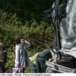 One dead and 60 to hospital after crash