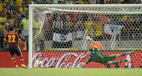 Penalty thriller puts Spain through to final