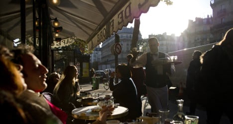 France bans smoking in covered café terraces