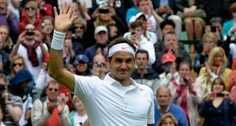 Federer advances as Nadal exits Wimbledon