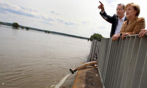Merkel pledges €100 million in flood aid