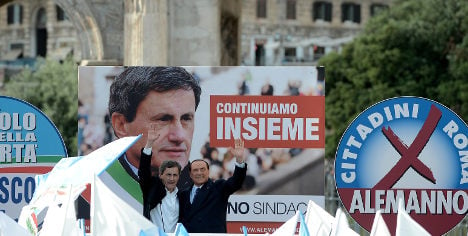 Berlusconi ally battles for survival in Rome vote