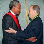 July 4th, 1994. Then South African president Nelson Mandela embraces his French counterpart François Mitterand in Cape Town, South Africa. The French President had just been given the Order of Good Hope Award by Mandela. Mitterrand was the first French premier to be received by Mandela as president. "One man, one voice, that is democracy. A liberated society, and no looking back," Mitterand had said.Photo: Gerard Fouet/AFP