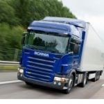 Scania plans production hike as profits fall