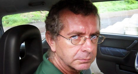 Body of French hostage flown home from Mali