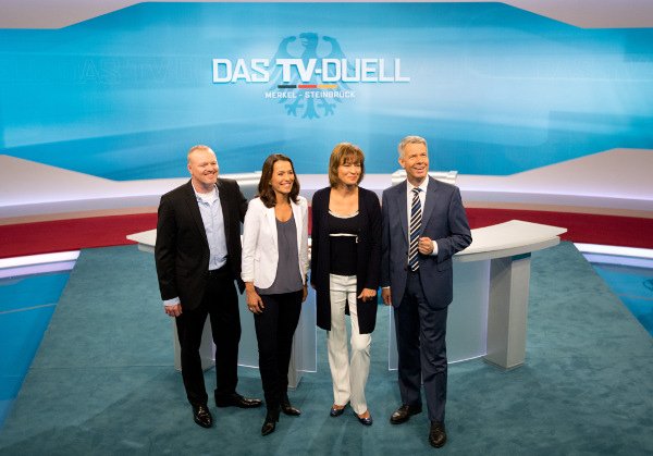 The four presenters who will host the live television debate between Chancellor Angela Merkel and her rival Peer Steinbrück hold a press conference ahead of Sunday's showdown. They are comedian Stefan Raab and presenters Anne Will, Maybrit Illner and Peter Klöppel.Photo: DPA