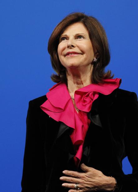 Queen Silvia of Sweden chose a bright cerise blouse for attending charity concert Future Unplugged in Lithuania, April 2011.Photo: AP/Scanpix