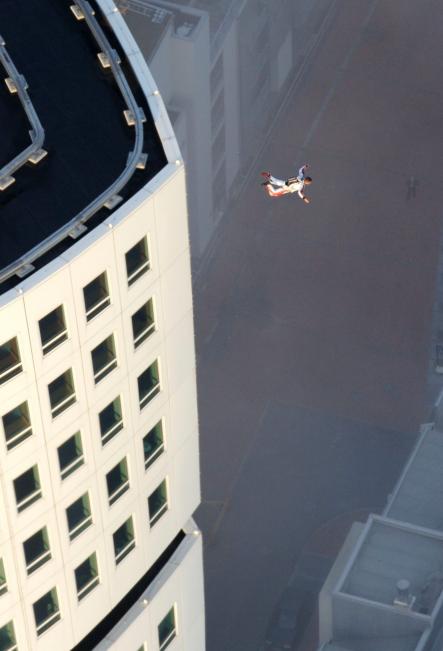 Daredevils also enjoy the view from the top, here we see extreme sportsman Felix Baumgartner illegally jumping from the building before he parachuted to safety and escaped authorities by taking a boat to Denmark.Photo: Scanpix Sweden