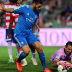 Benzema helps Real grind out Granada win