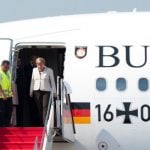 The man who gate-crashed Merkel’s plane