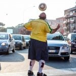 "Sometimes I get on a random train; it's like travelling to another country. I love how unpredictable it can be; like seeing this Italian guy in a Brazil shirt."Photo: Humans of Rome/Marco Massa