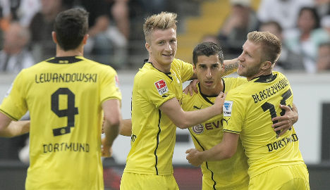 Dortmund keep unbeaten record to go top
