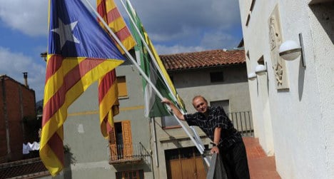 Rebel Catalan town leads Spanish break-up fight