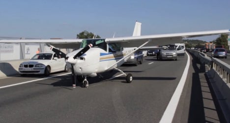 VIDEO: Tourist plane lands on busy motorway