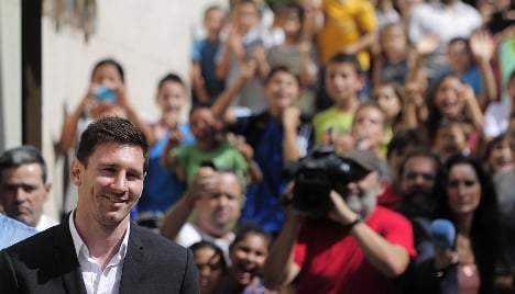 Messi answers tax charges in court