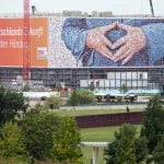 Huge Merkel hand poster sparks outcry