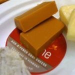 Norwegian brown cheese, brunost. is technically not cheese at all, as it's made from whey and not curds. Most foreigners find it sickly sweet, flavourless, and cloying to the tongue.   Photo: Leslie Seaton