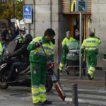 Striking street-sweepers clean up messy Madrid