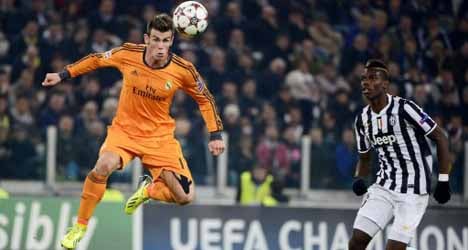 Real almost through after thrilling draw with Juve