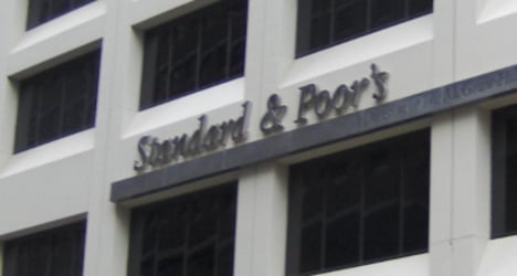 S&P downgrades French credit rating to AA