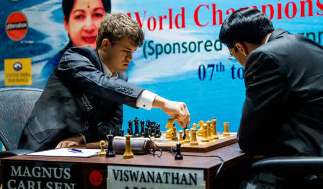 Carlsen ahead in world chess duel with Anand