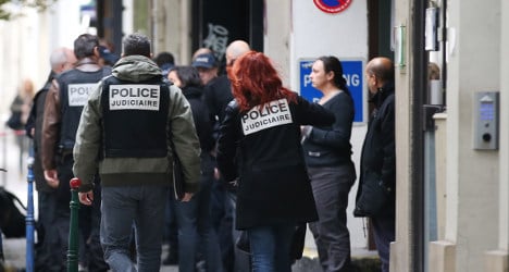 In pictures: Gunman brings terror to streets of Paris
