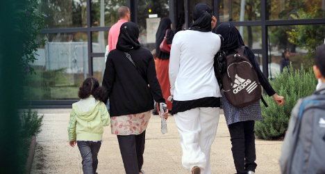France urged to scrap veil ban for school trips