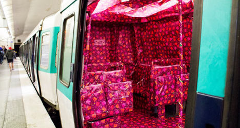 Paris Metro gift-wrapped for Christmas