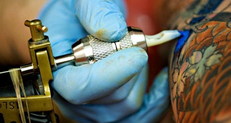 Coloured tattoos escape ban in France