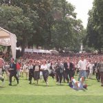 Guests at the traditional Bastille Day garden party rush to welcome South African President Nelson Mandela and his French counterpart Jacques Chirac on the 14 of July , 1996 in the gardens of the Elysee Palace following the military parade where the South African Nobel Peace prize winner was a guest of honour on the second day of his state visit in France.Photo: AFP