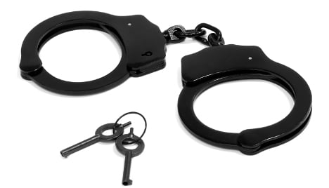 Police free boy, 6, from parents' sexy handcuffs