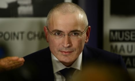 Freed Kremlin critic arrives in Switzerland