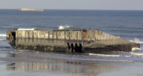 Remnants of D-Day harbour wear away at sea