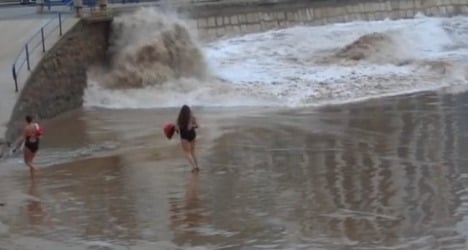 VIDEO: Dancing woman swept away by wave
