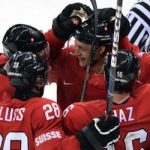 Swiss hockey team beats Latvia in dying seconds