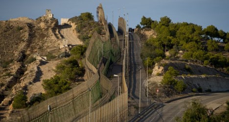 Desperate migrants storm fences in Melilla