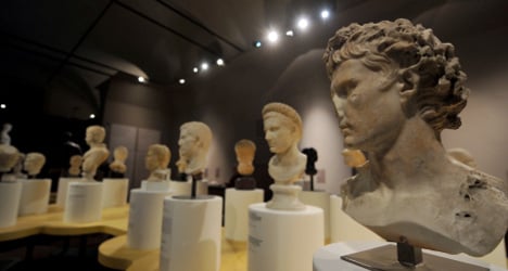 Italy reclaims looted treasures from Swiss